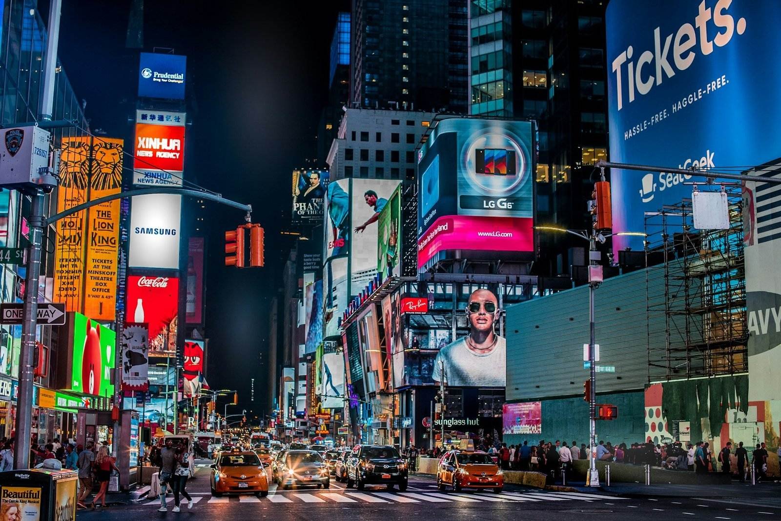 Dynamic visual of a high-resolution digital billboard showcasing vibrant advertisements in an urban setting